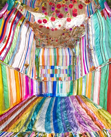 Raissa Venables "Sukkah" large scale photograph of a Bedouin-like tent collaboration piece with Rachel Hayes fabric work - striped and very colorful